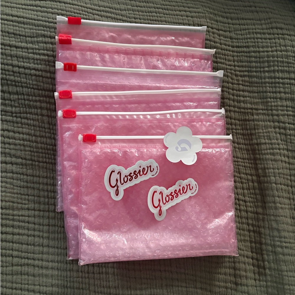 Glossier pink pouches and stickers - 4 regular and 2 mini